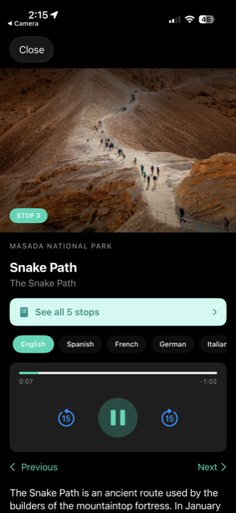 Site guide stop detail, Masada Snake Path, with photo, language selector, and audio player with Previous and Next buttons